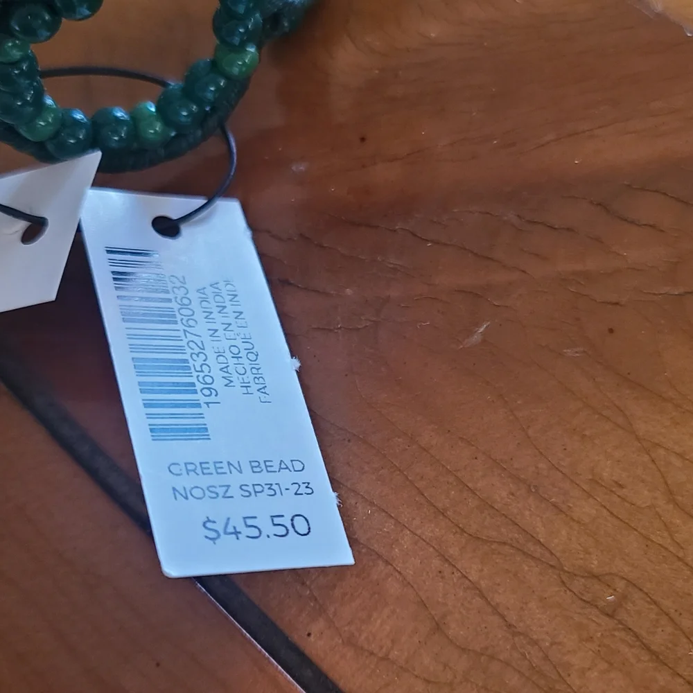 Chicos dark green beaded cuff bracelet. New with tags.